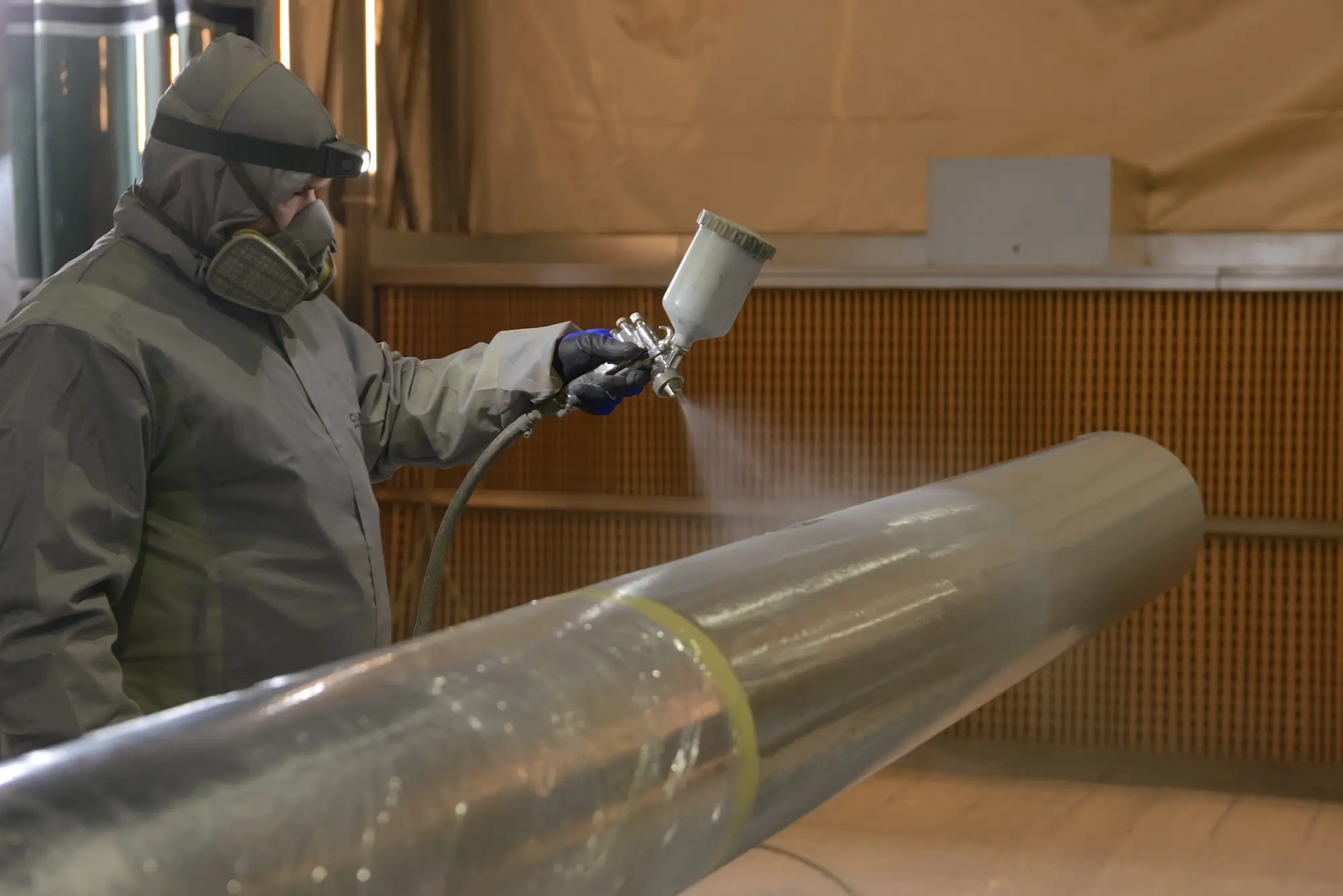 Duplex system painting process, applying paint to a galvanized surface for additional corrosion protection.