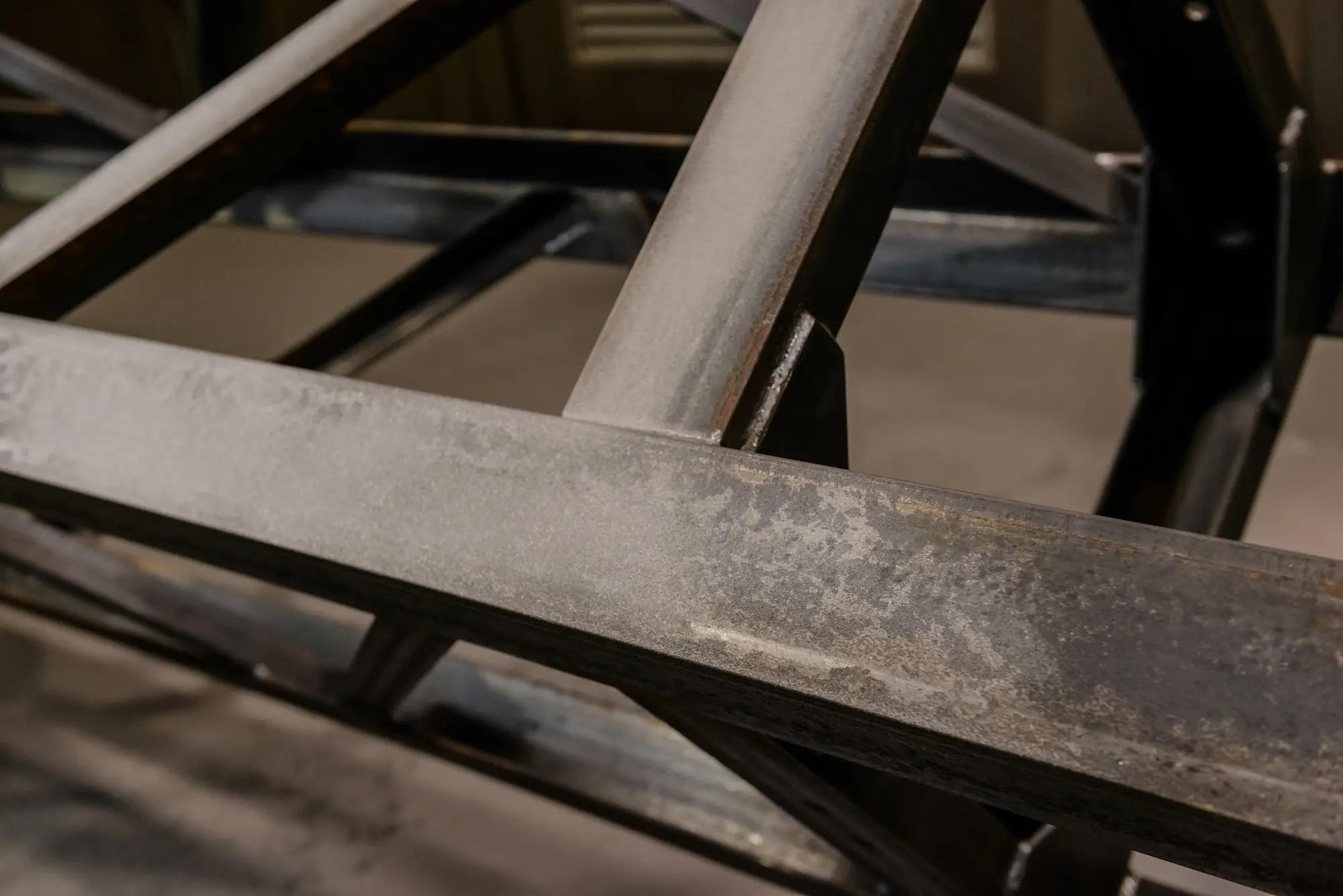 High-quality cleaned metal structure surface and weld seams after the shot blasting process.